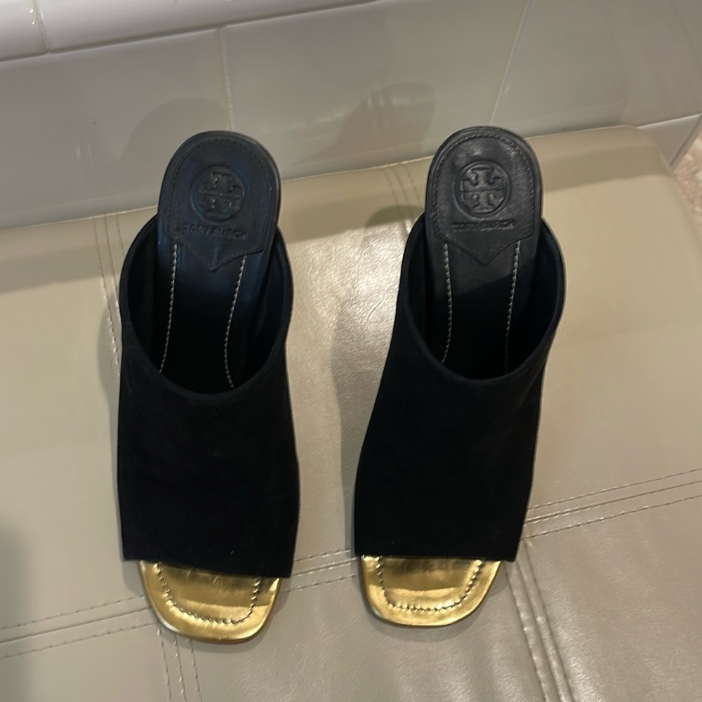 Tory Burch slip on heels . Black suede top and gold heels . Size 8 . Used